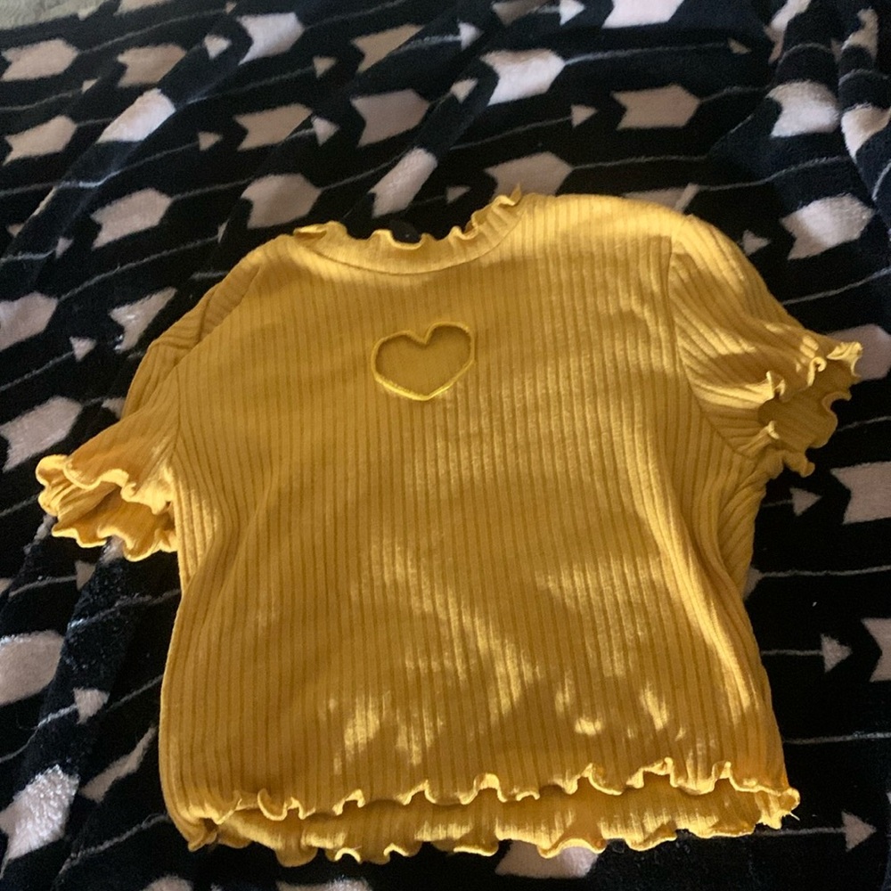A crop top with a heart in the middle